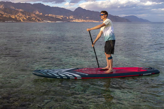 Gladiator Pro 12'6 S Touring Paddleboard With Male Paddler On The Sea