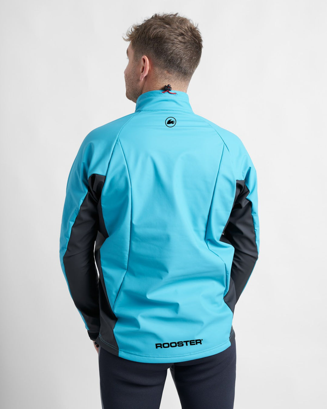 Back View of Rooster Active Aquafleece Top on a Male Model