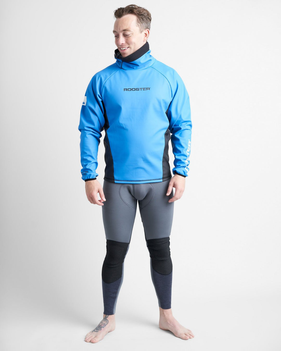 Full Body image of male model wearing a blue Rooster Classic Aquafleece Top