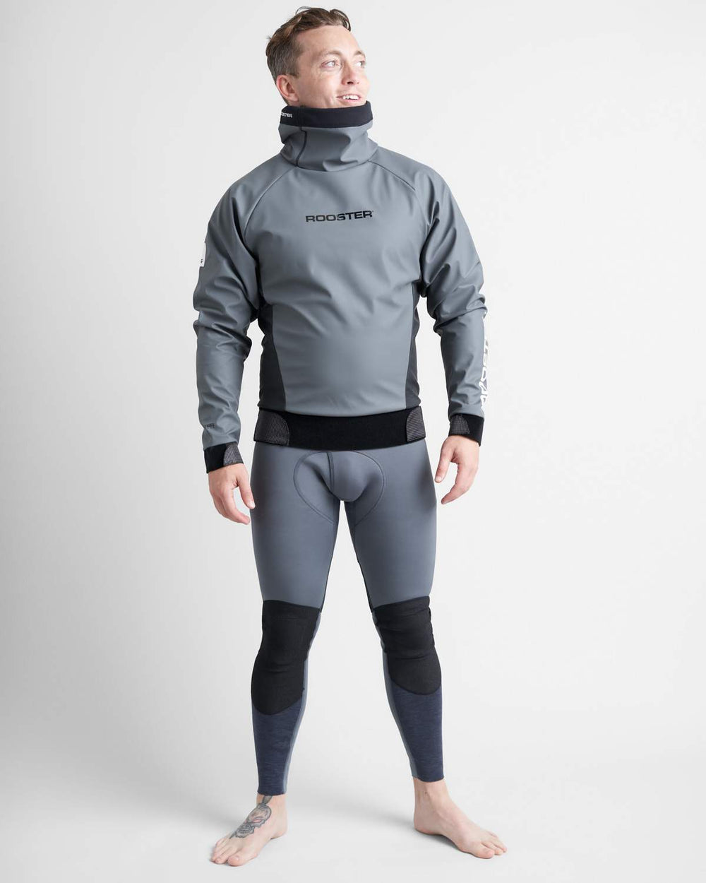 Rooster Pro Lite Aquafleece Top in Grey, modelled by a male in a studio