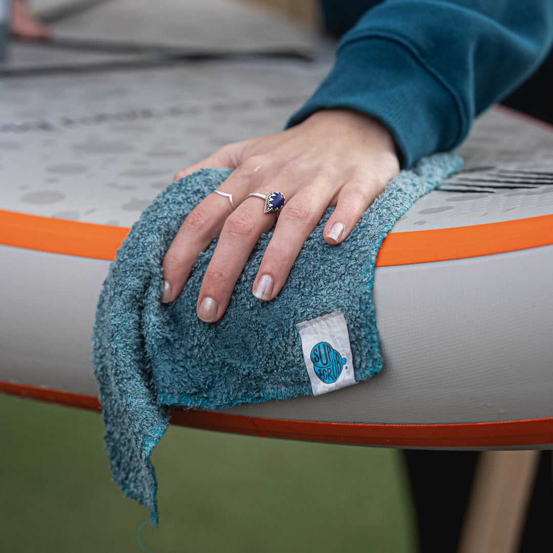 Using Teal Colour SUPscrub bamboo fibre cloth to clean a Shark SUP