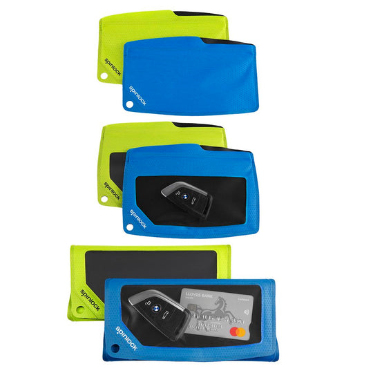 Spinlock Waterproof packs, Studio image showing blue and yellow variants with car keys and bank card