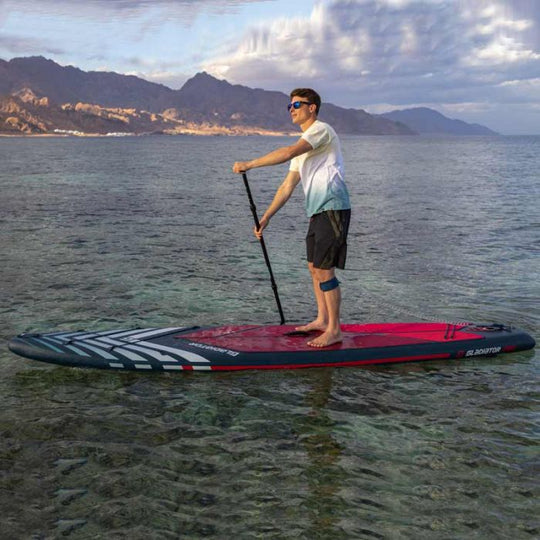 Gladiator Pro 12'6 Touring Paddleboard with Male Paddler on the Sea