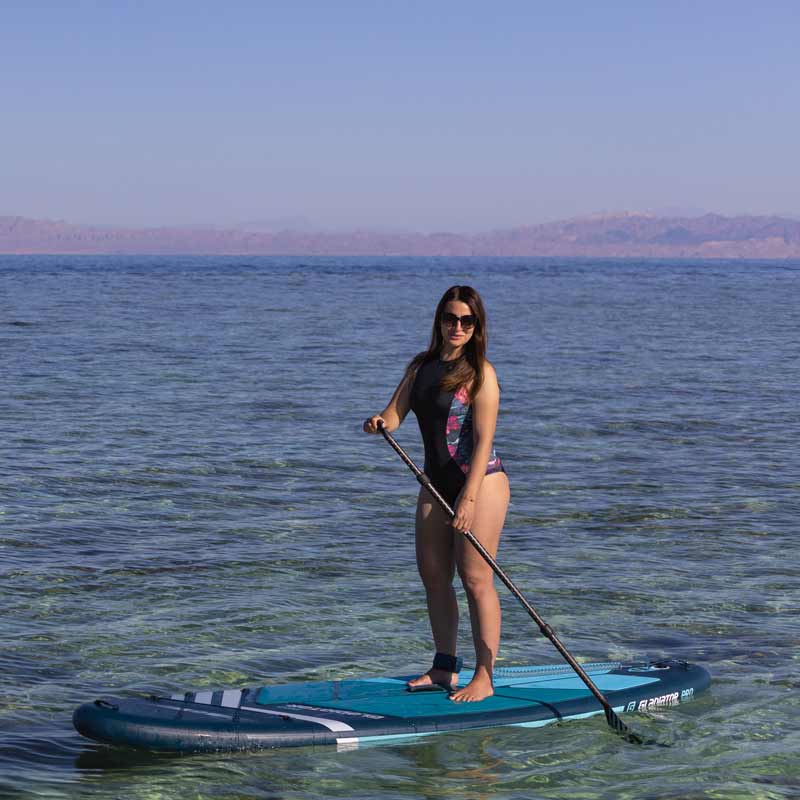 Gladiator Pro 10'4 Paddleboard With Female Paddleboarder on sea